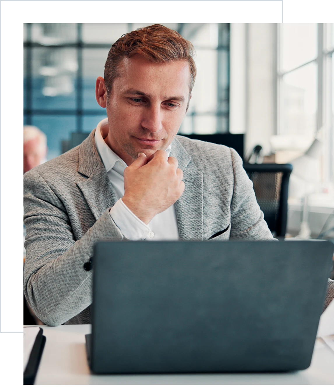 Man working on laptop in office